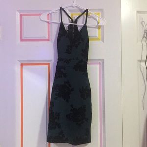 Gorgeous emerald green and black cocktail dress